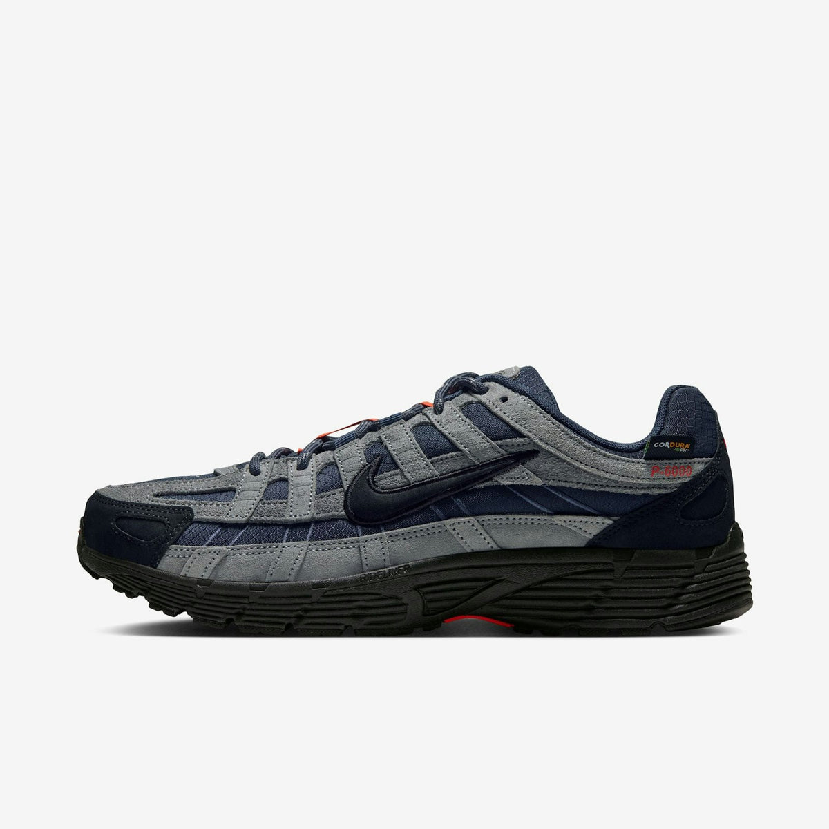 Nike P-6000 Cordura "Thunder Blue" side profile in navy ripstop and grey suede on a black sole. Photo via Highsnobiety