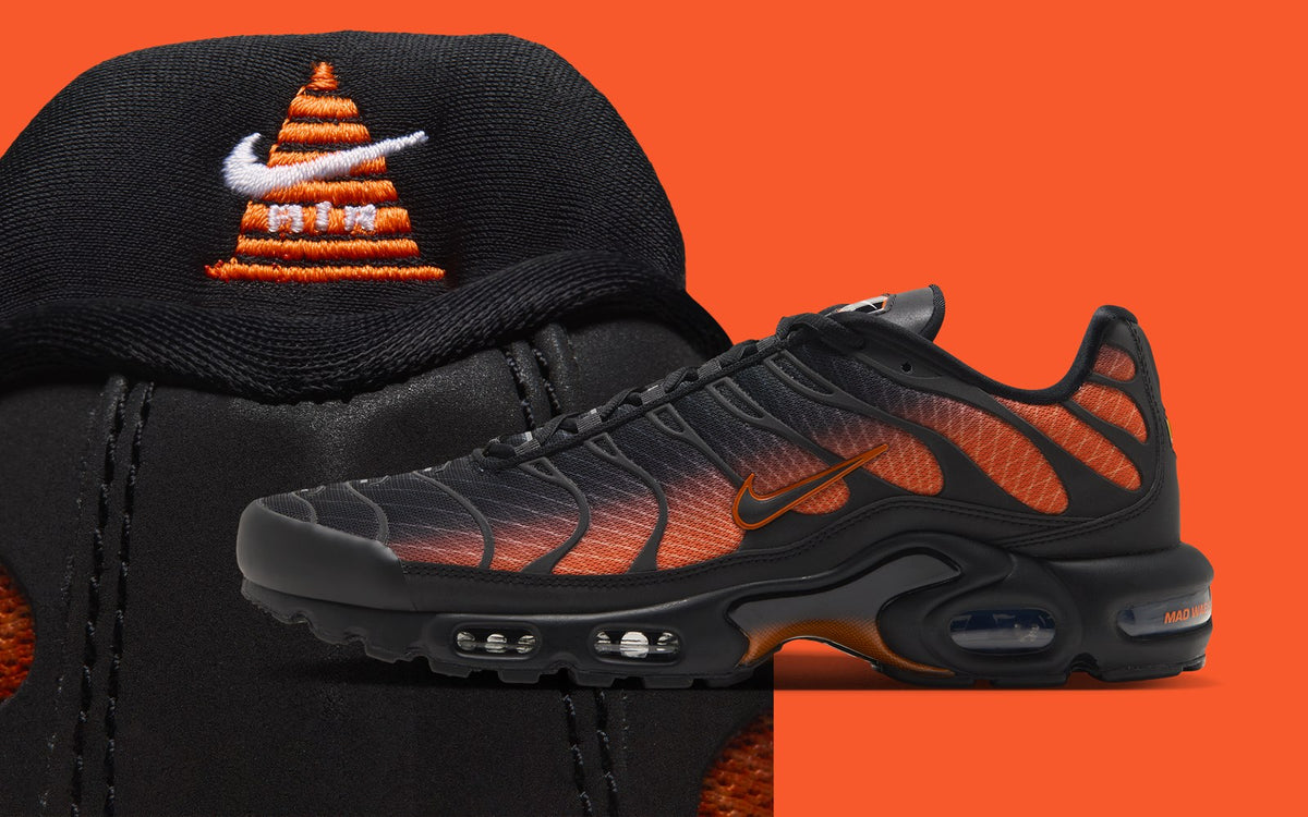 Nike Air Max Plus Glasgow IX7920-001 in Black/Safety Orange with traffic cone tongue badge. Official Nike photo via House of Heat