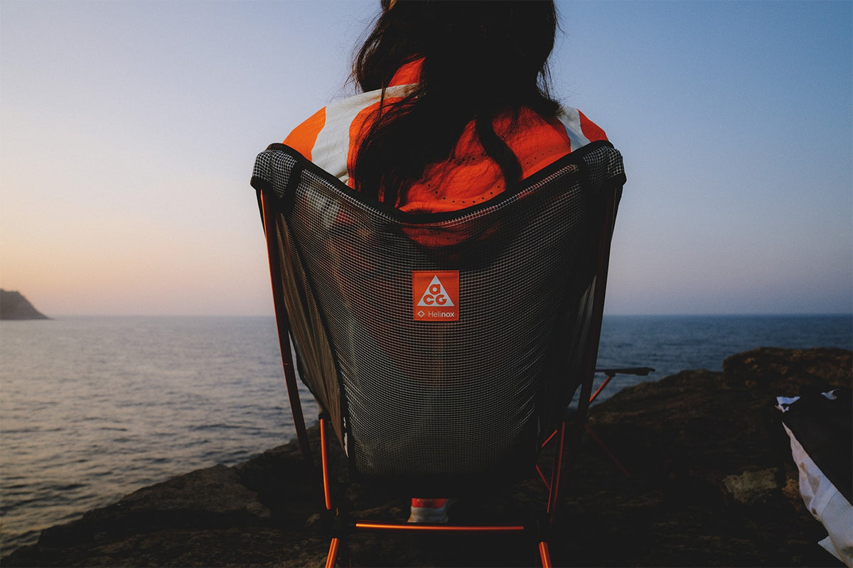 Nike ACG x Helinox Chair Zero LT by the sea. Photo via Hypebeast / Nike ACG