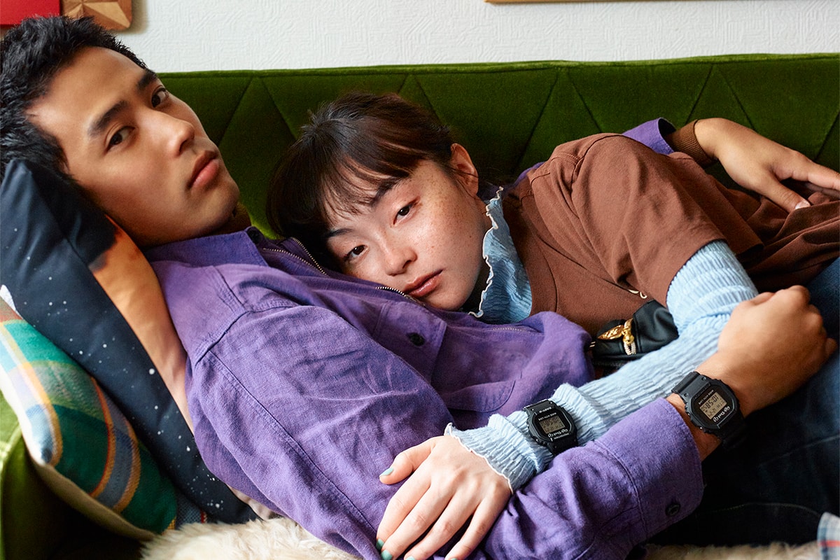 Couple on a sofa wearing the VERDY Girls Don't Cry G-SHOCK and BABY-G pair watches. Photo via Hypebeast Japan