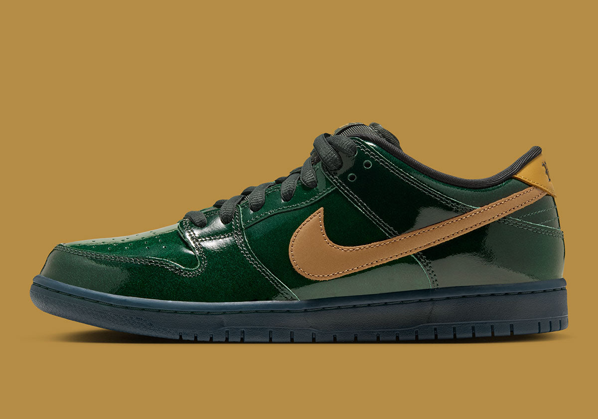 Nike SB Dunk Low Champagne IQ0431-300 in green patent leather with gold Swoosh, image via Sneaker News
