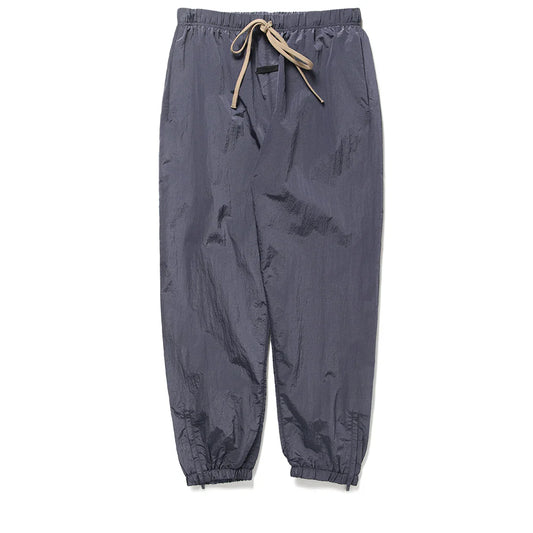 Fear of God Essentials Ripstop Trackpants in Marine