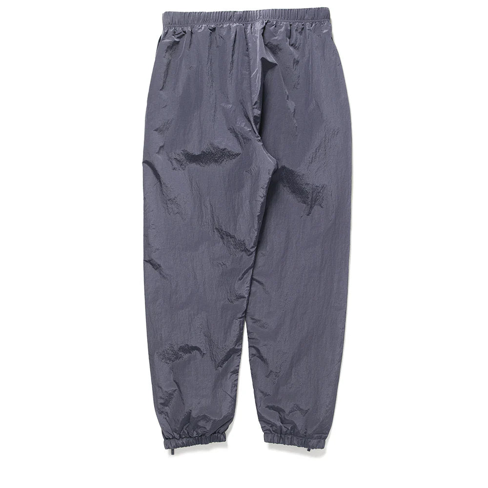 Fear of God Essentials Ripstop Trackpants in Marine