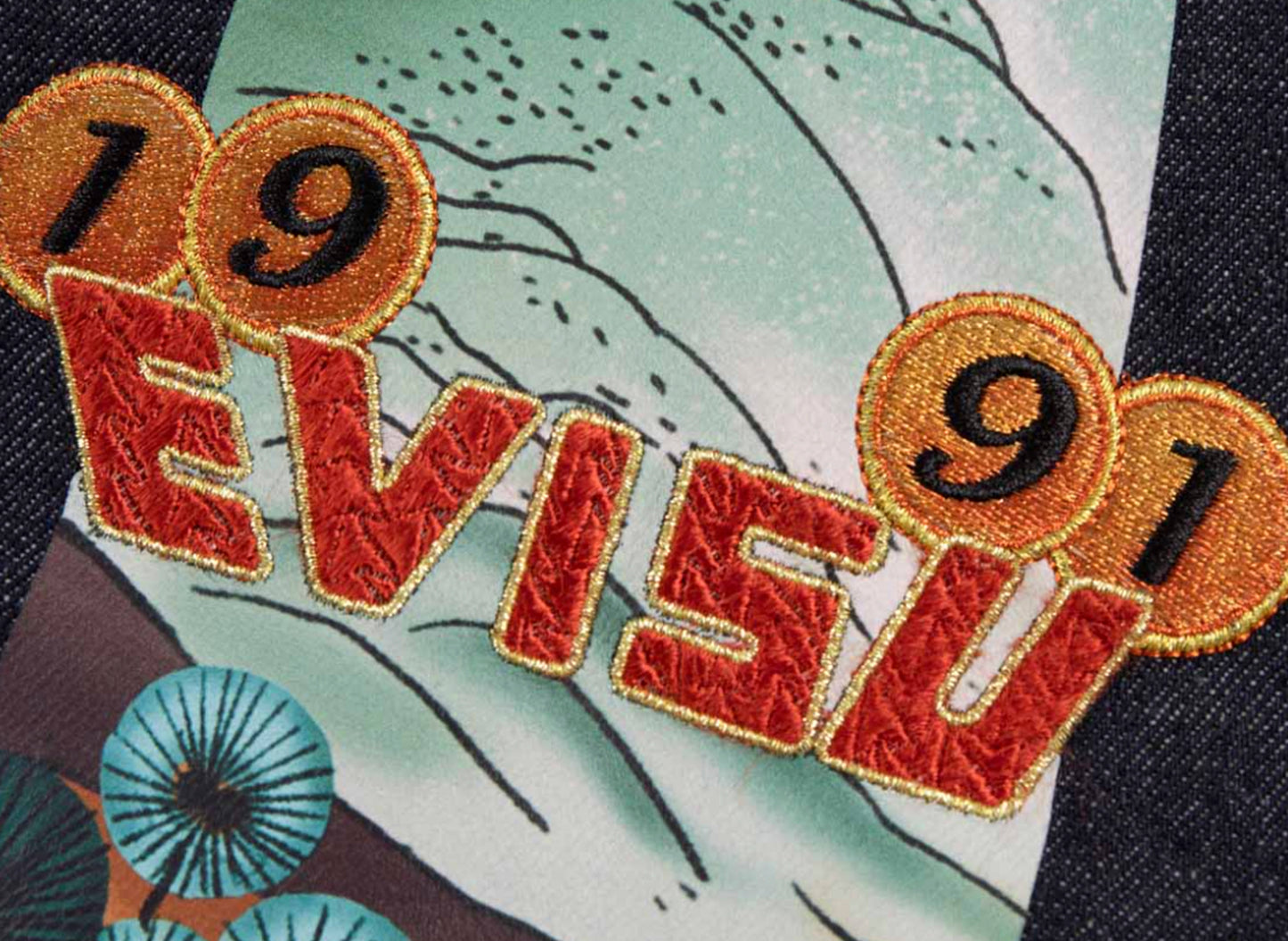 Jean en denim à jambe large brodé Evisu motif pin Daicock