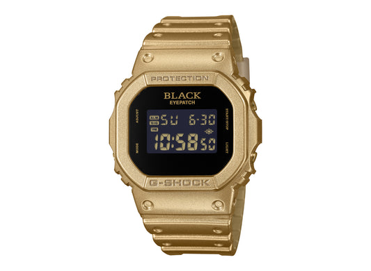 Casio G-Shock x BlackEyePatch DW5600BEP-9 in Gold / Black — front view