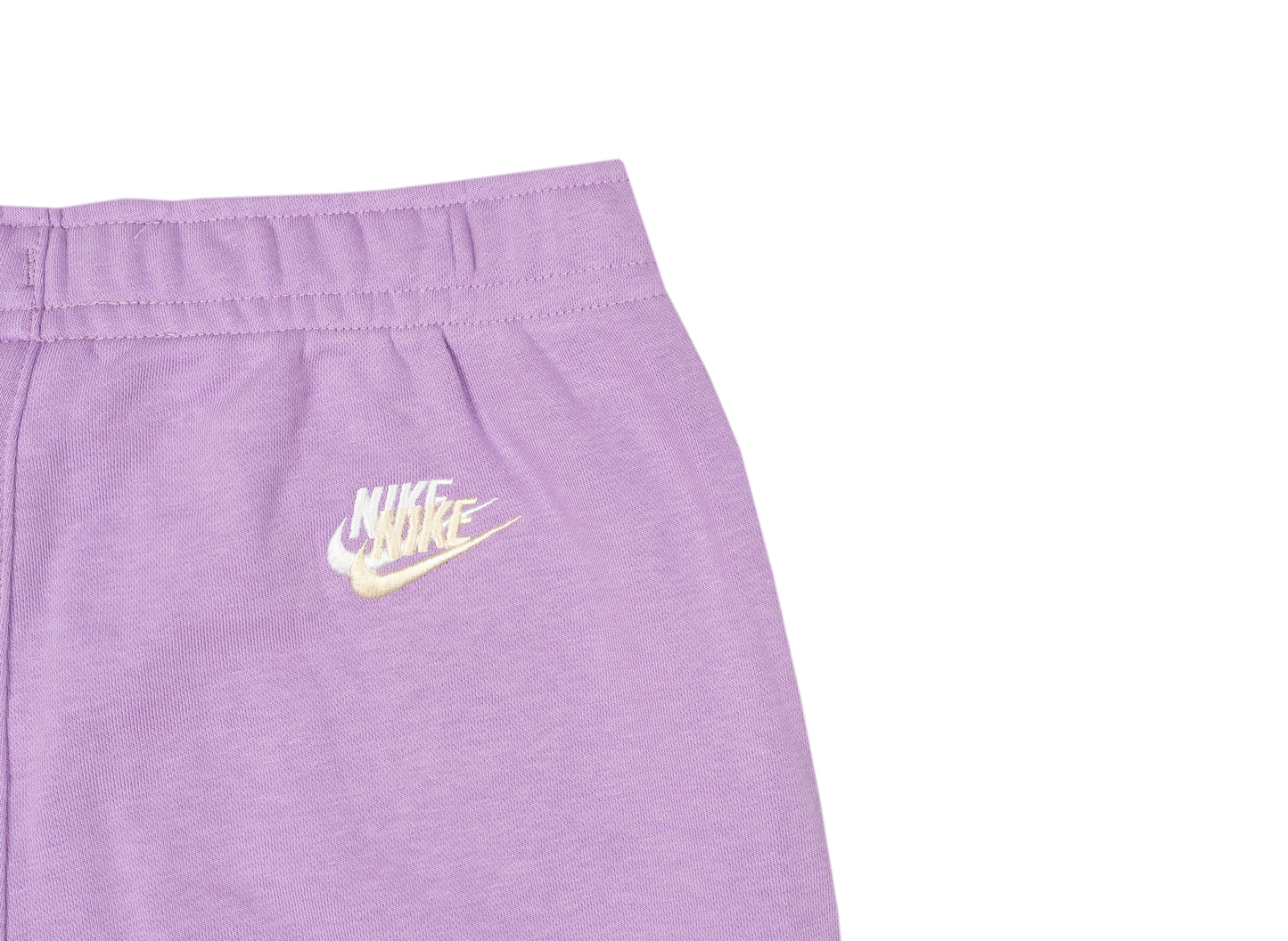 Pantalones de felpa Nike Sportswear Essentials+ en color violeta