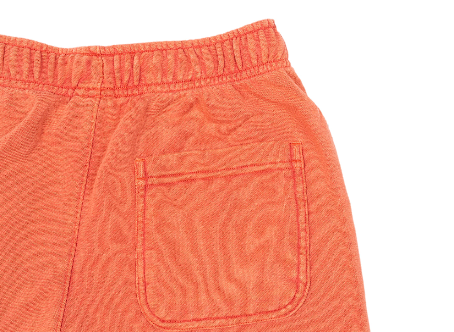 Nike Sportswear Essentials+ Washed Shorts in Lobster