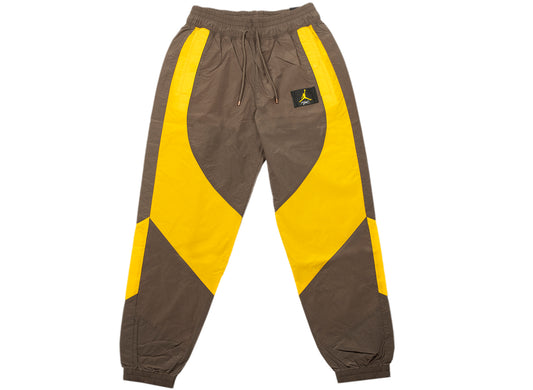 Women's Jordan Woven Pants in Ironstone / University Gold