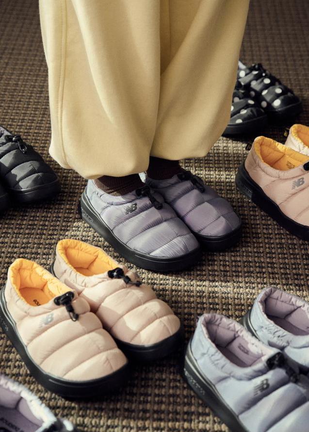 New Balance Sleeping Moc in gray, beige/yellow and black on the floor, image via Fullress