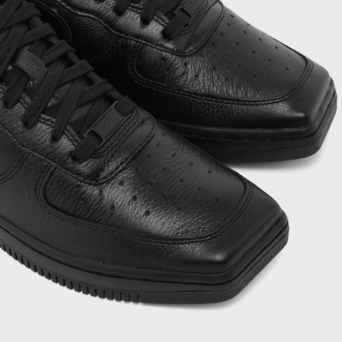 Nike Air Force 1 Squair Toe in black tumbled leather, toe box close-up. Photo via Highsnobiety