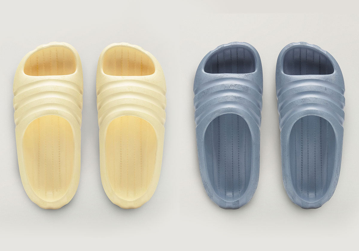 Bad Bunny adidas BadBo Stone Slides in yellow and blue, image via Sneaker News