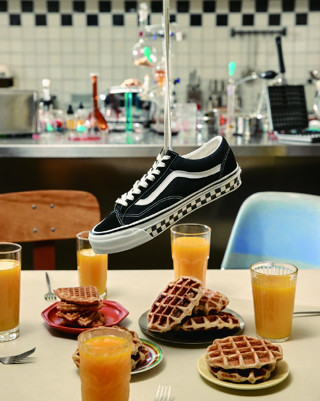 Vans Premium Old Skool 36 Checkerboard Sidewall hanging over waffles and lab glassware in Oh What Fun campaign