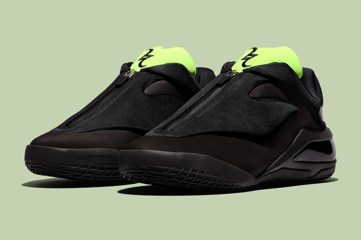 Converse SHAI 001 Shroud “Shock” pair in black with neon volt tongue unzipped, official press