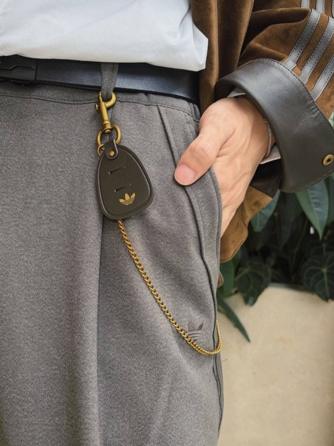 adidas Originals Refined Luxe FW26 — on-model suede jacket, grey trousers, Trefoil leather fob