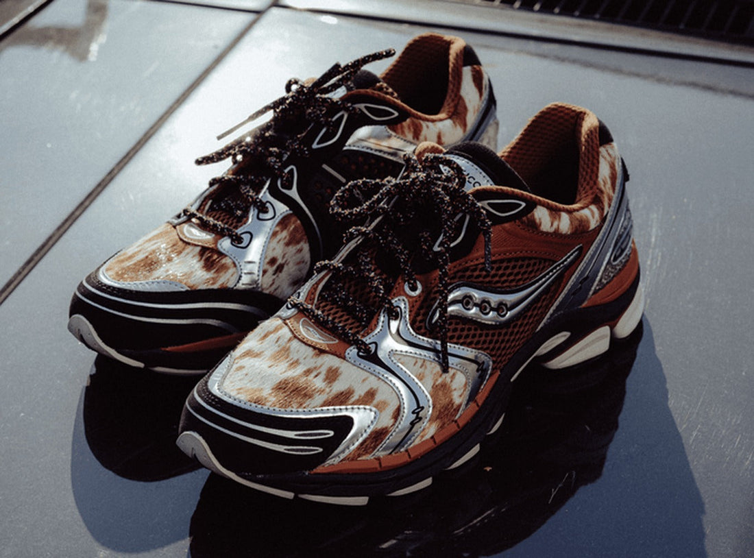 Saucony Space Cowboy ProGrid with cowhide and chrome on car hood — official campaign