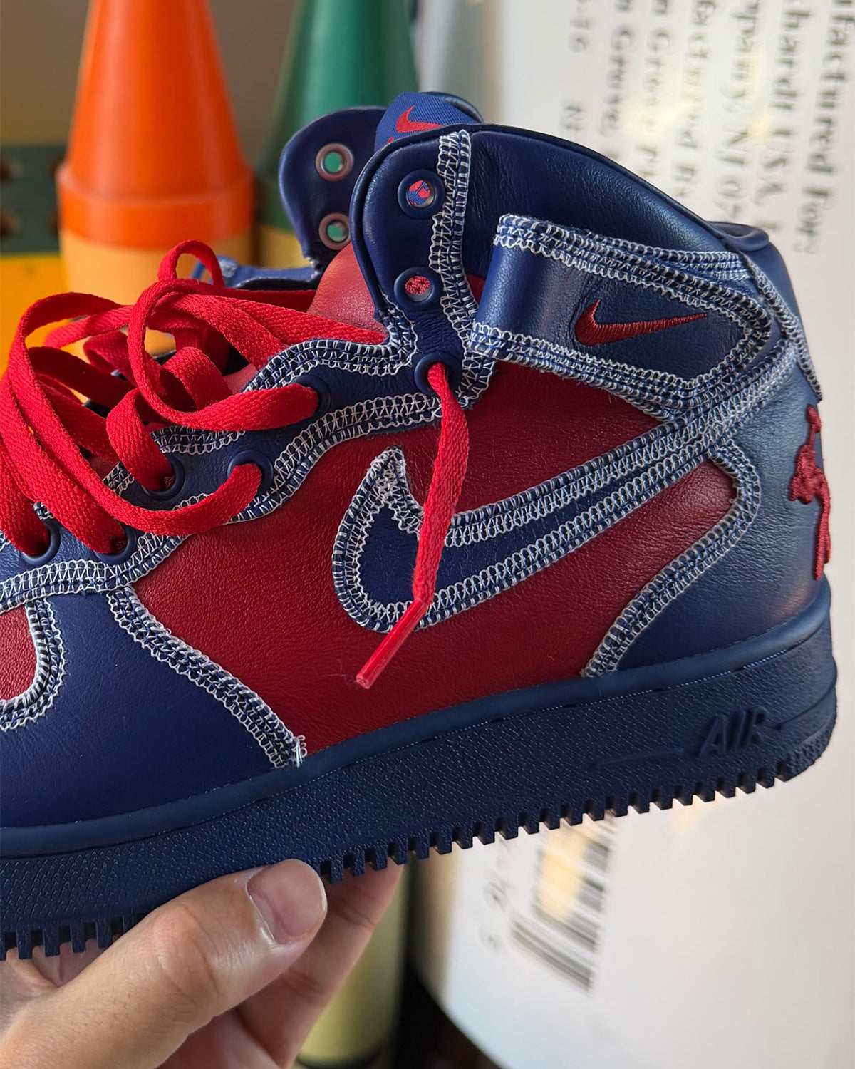 Lil Yachty Nike Air Force 1 Mid red/blue IW9834-600, photo via Sneaker News