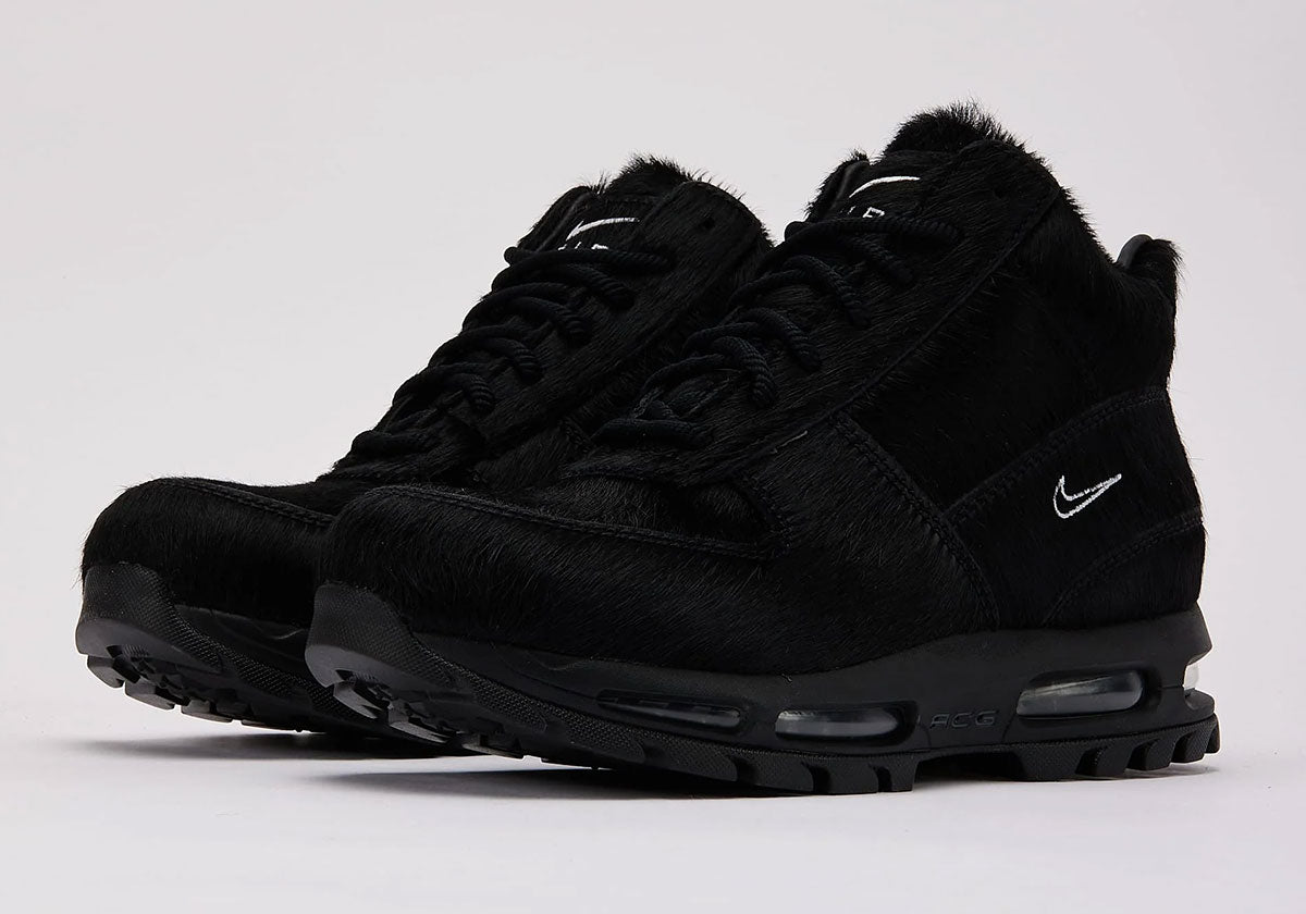 Nike Air Max Goadome Black Pony Hair IO4635-001 pair, all-black pony hair with white outline Swoosh. Photo via Sneaker News