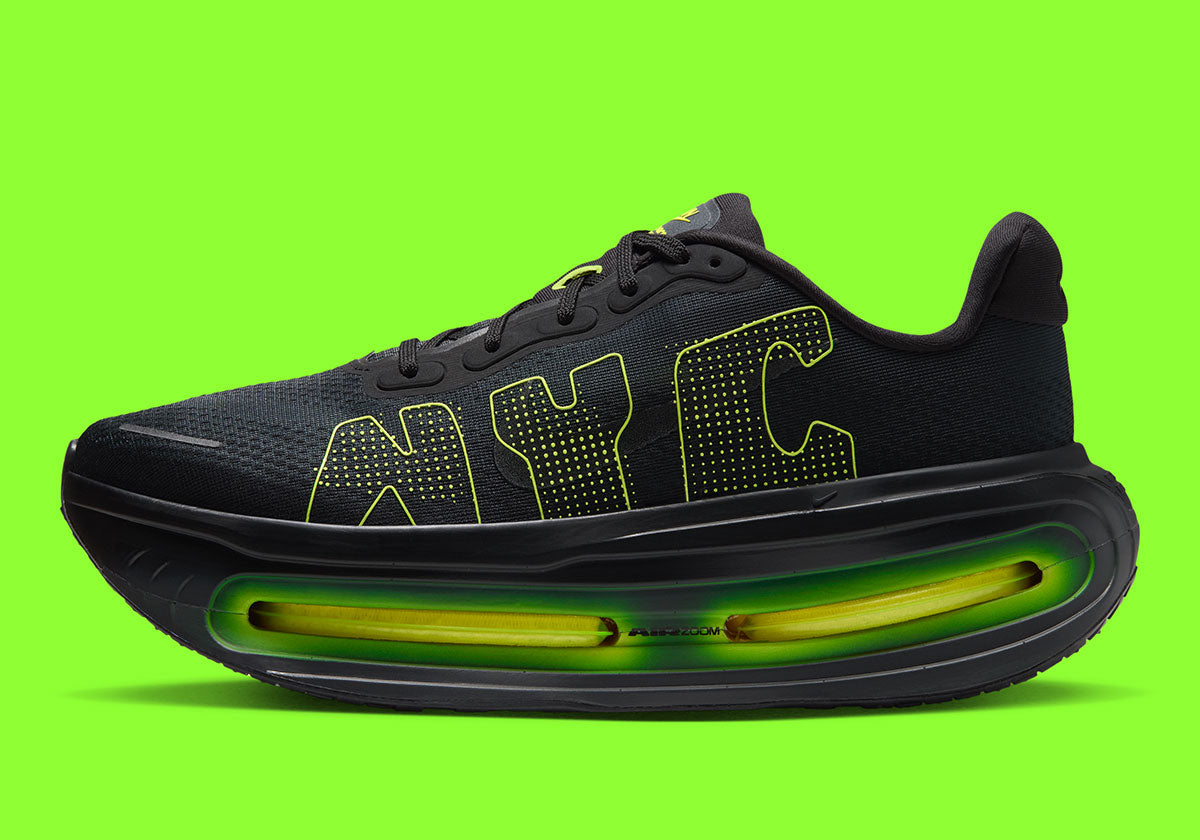 Nike Vomero Premium NYC JA4059-010 in black with Lemon Venom NYC lettering and glowing Zoom Air, image via Sneaker News