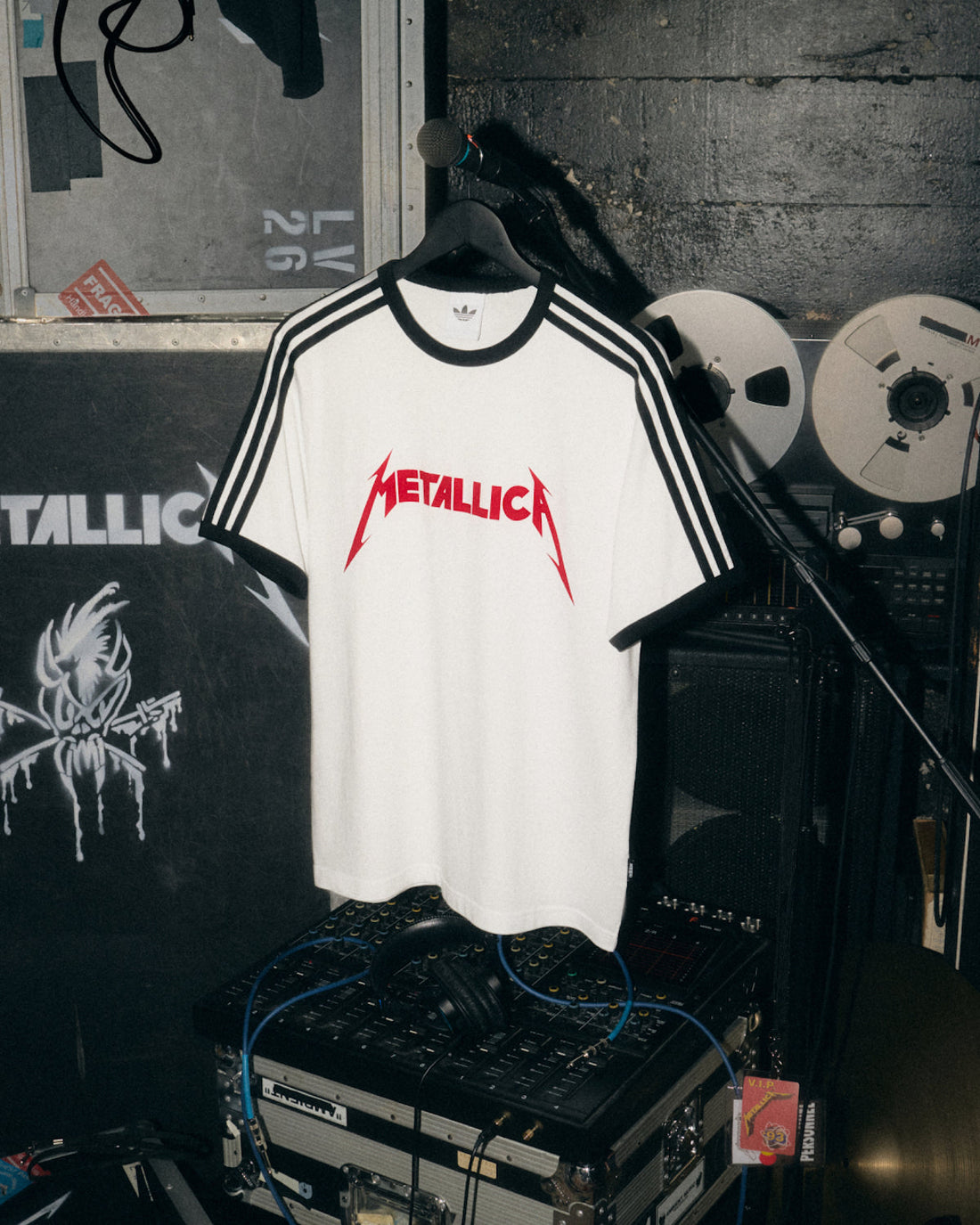 adidas Originals × Metallica Life Burns Faster tee on mic stand in studio scene — official adidas campaign