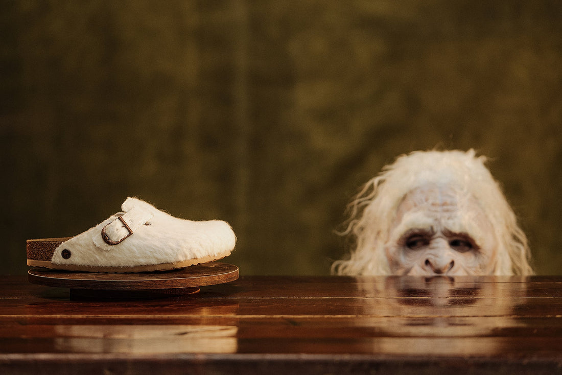 Birkenstock by Cole Bennett furry Boston clog on pedestal with yeti character — official Birkenstock 1774 campaign