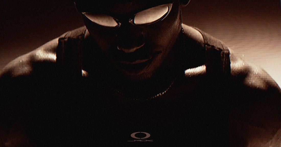 Cactus Jack x Oakley campaign still — on-model wrap sunglasses — official Travis Scott / Oakley