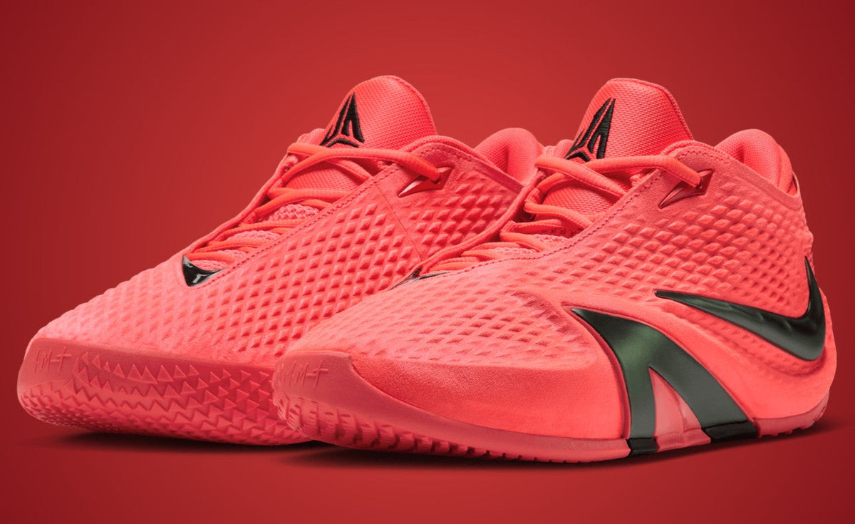 Nike Ja 4 Code Red IM4135-602 in Bright Crimson with black Swoosh. Photo via Sole Retriever