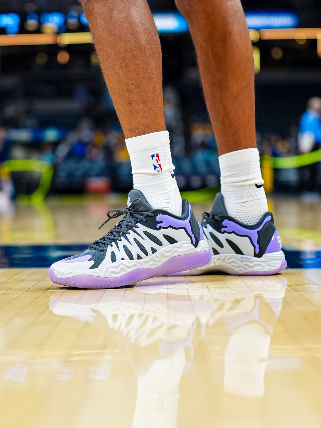 Tyrese Haliburton on the court in the PUMA Hali 1 “Teddy Lockart,” a black pair with a white cage and violet PUMA cat logos and outsole — official Indiana Pacers photo