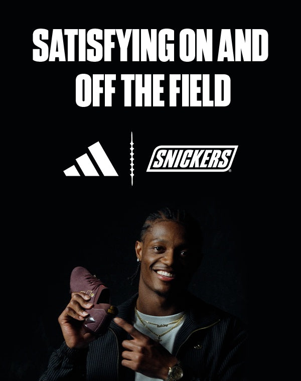 Snickers × adidas campaign — athlete holds Adizero Electric II cleat, points to GO NUTS heel — official snickers.com/adidas