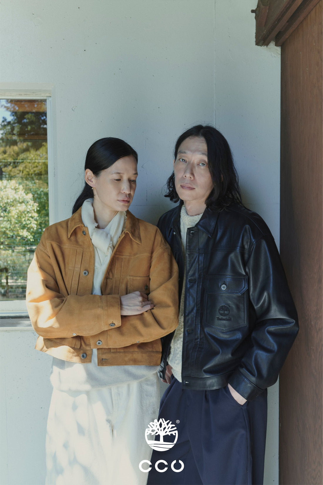 Two models in the Timberland × CCU wheat suede trucker jacket and black leather trucker jacket — official campaign image