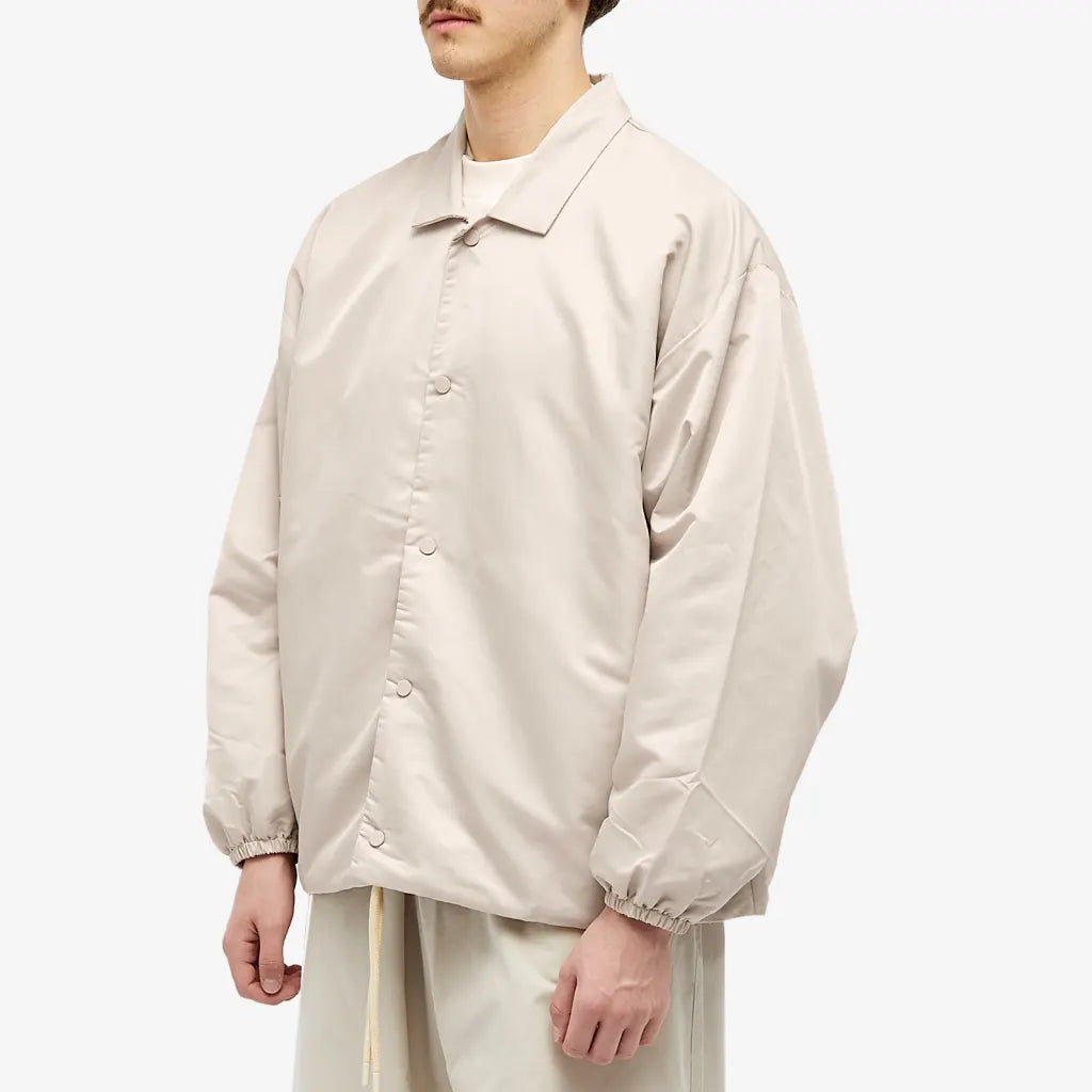 Fear of God Essentials Coaches Jacket in Silver Cloud