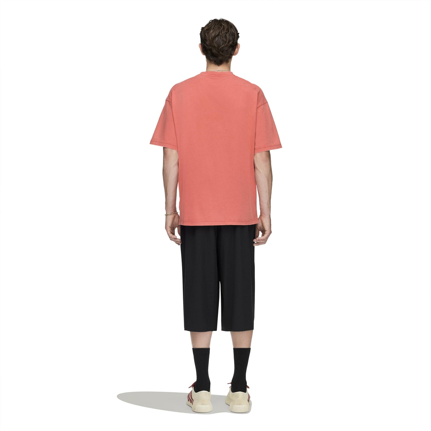 Adidas x Tyrrell Winston Long Shorts in Black – on model back