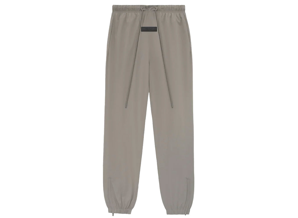 Fear of God Essentials Nylon Track Pants in Dust