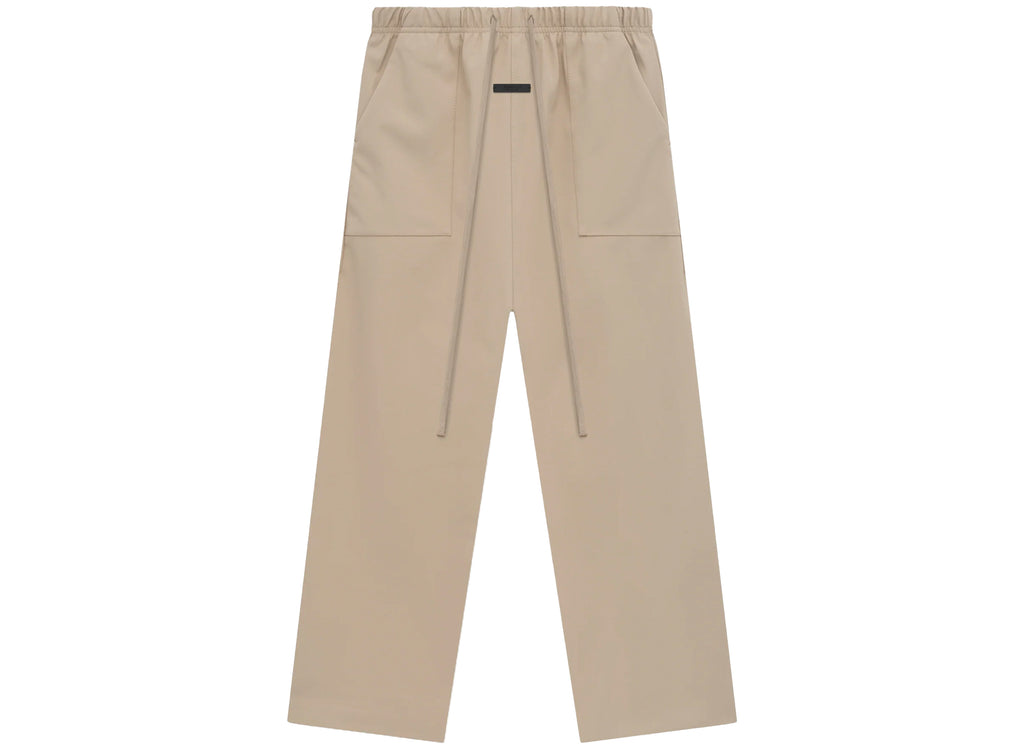 Fear of God Essentials Bonded Nylon Utility Pants in Desert Sand