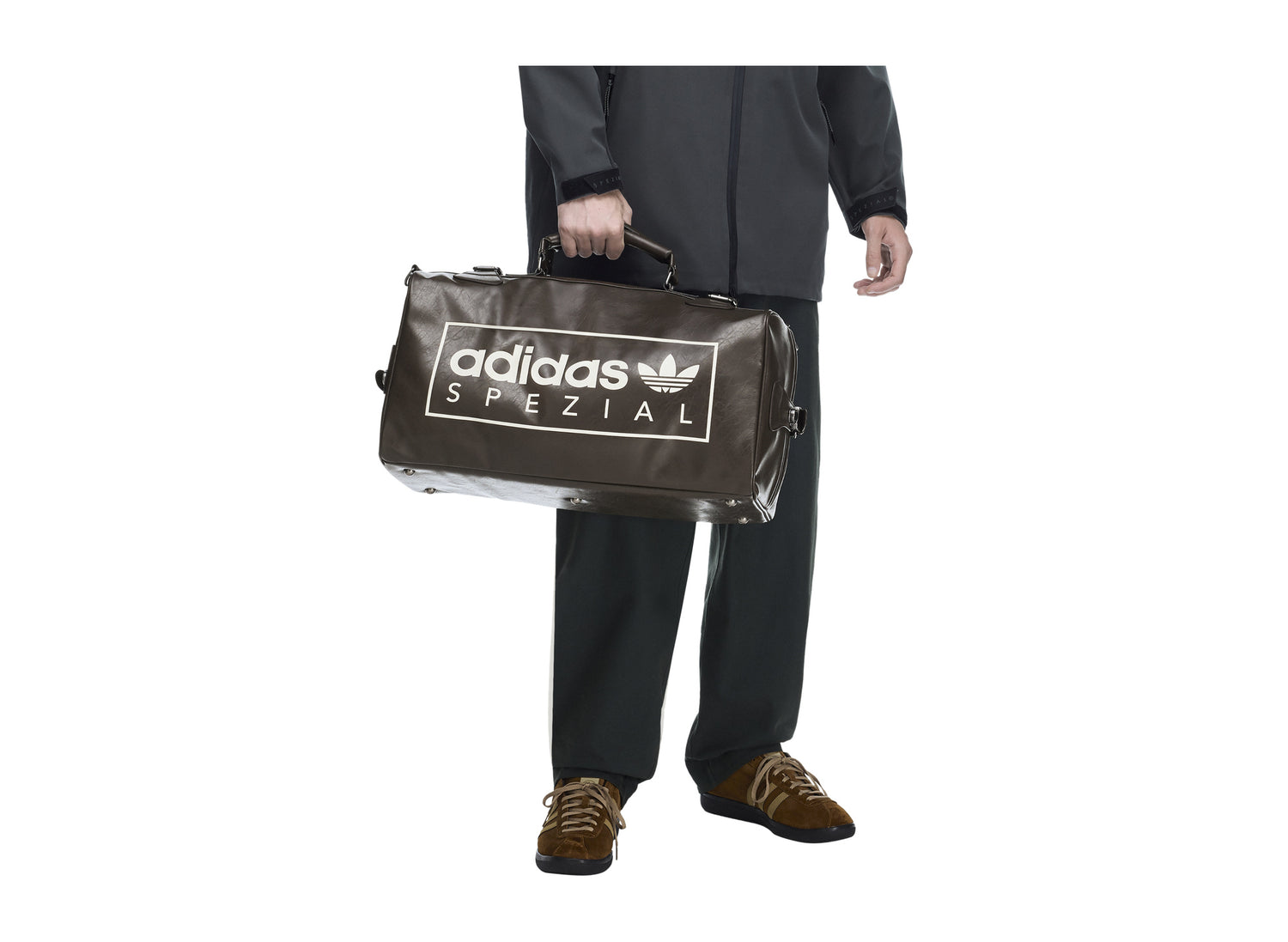 Adidas Standish SPZL Bag in Dark Brown — on model handheld