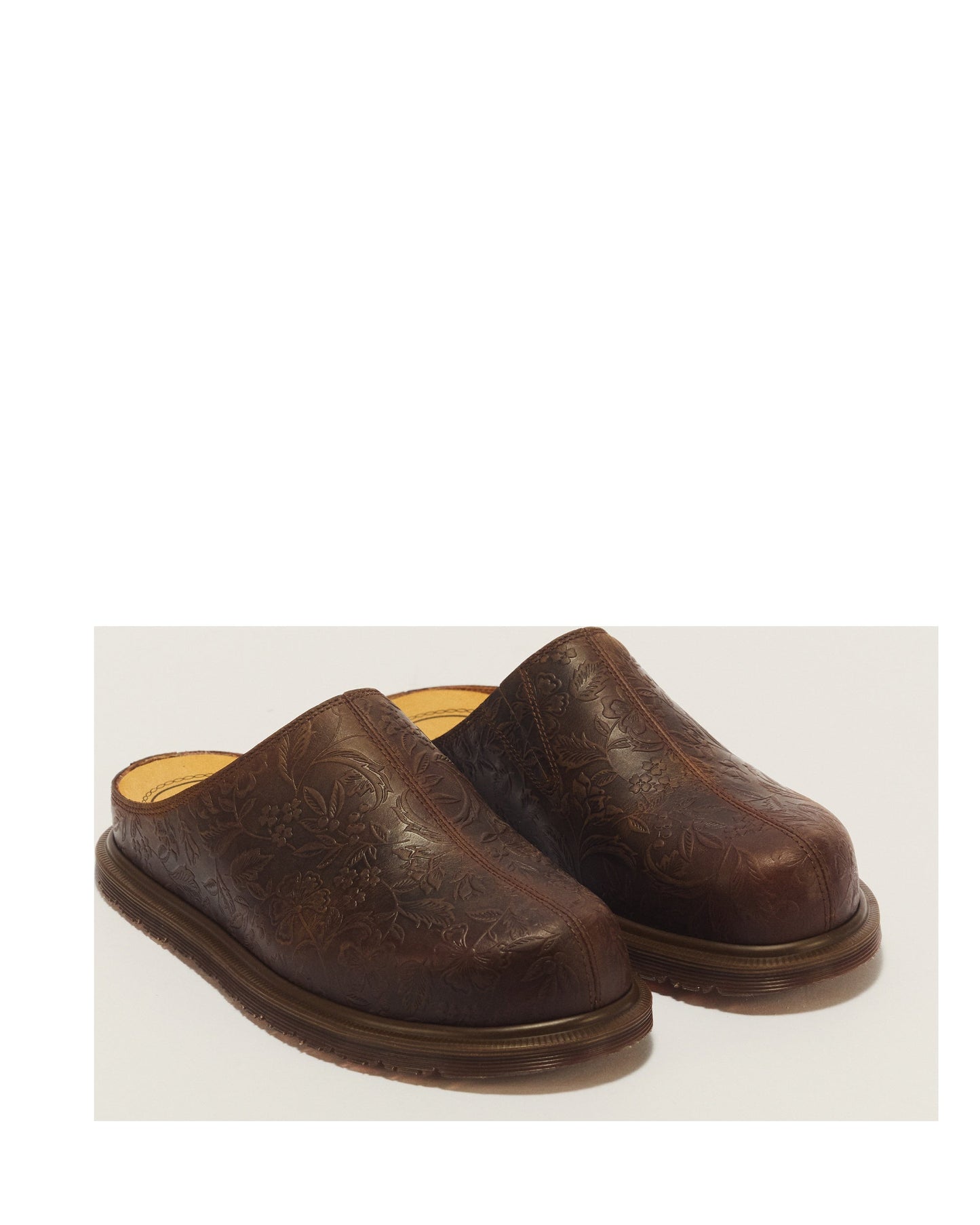 Dr. Martens San Floral Emboss Crazy Horse Leather Mules angled view