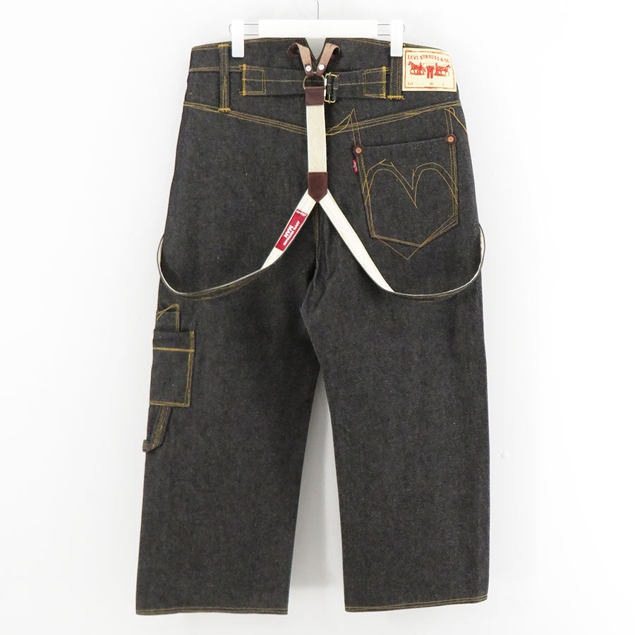 Junya Watanabe MAN x Levi's suspenders denim pants in black back view