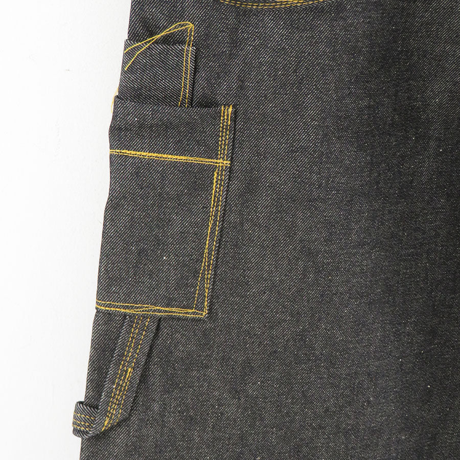 Junya Watanabe MAN x Levi's suspenders denim pants in black side tool pocket detail