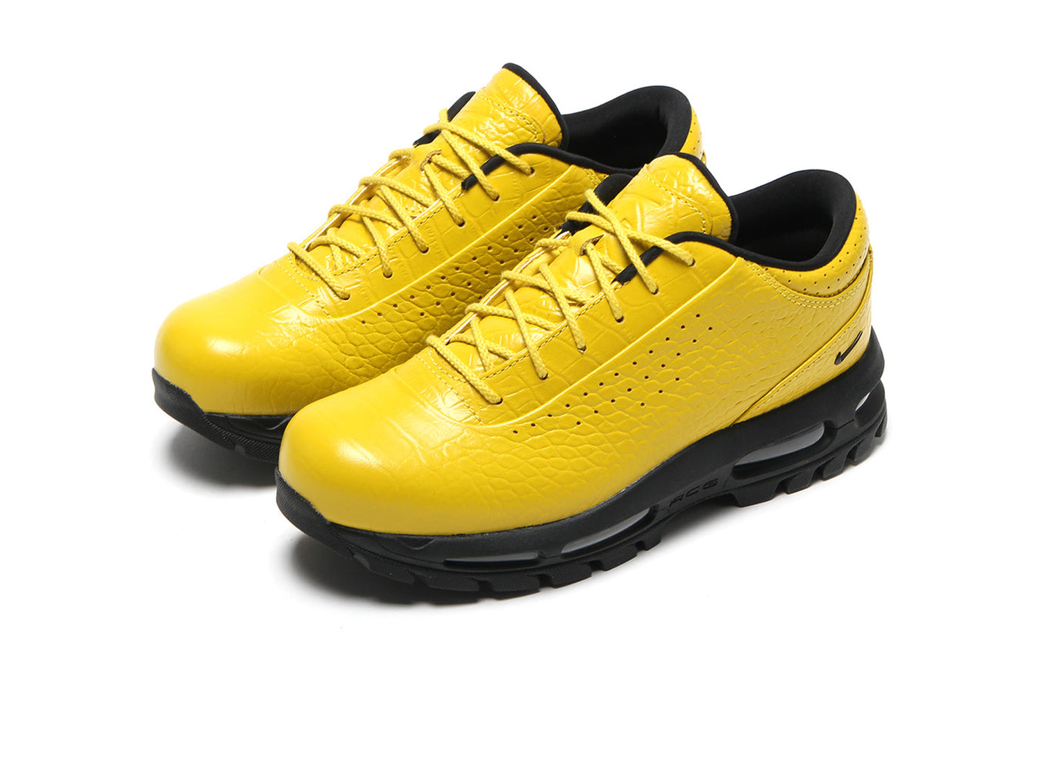 Nike Air Max Goadome Low IV4517-700 in Vivid Sulfur / Black — front angle pair