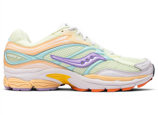 Oneness Boutique Saucony Progrid Omni 9 lime and orchid running shoes with mesh upper and purple accents.