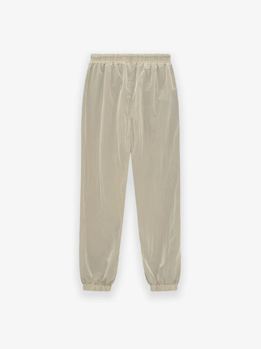 Fear of God Essentials Crinkle Nylon Trackpants in Garden Yellow - view 2