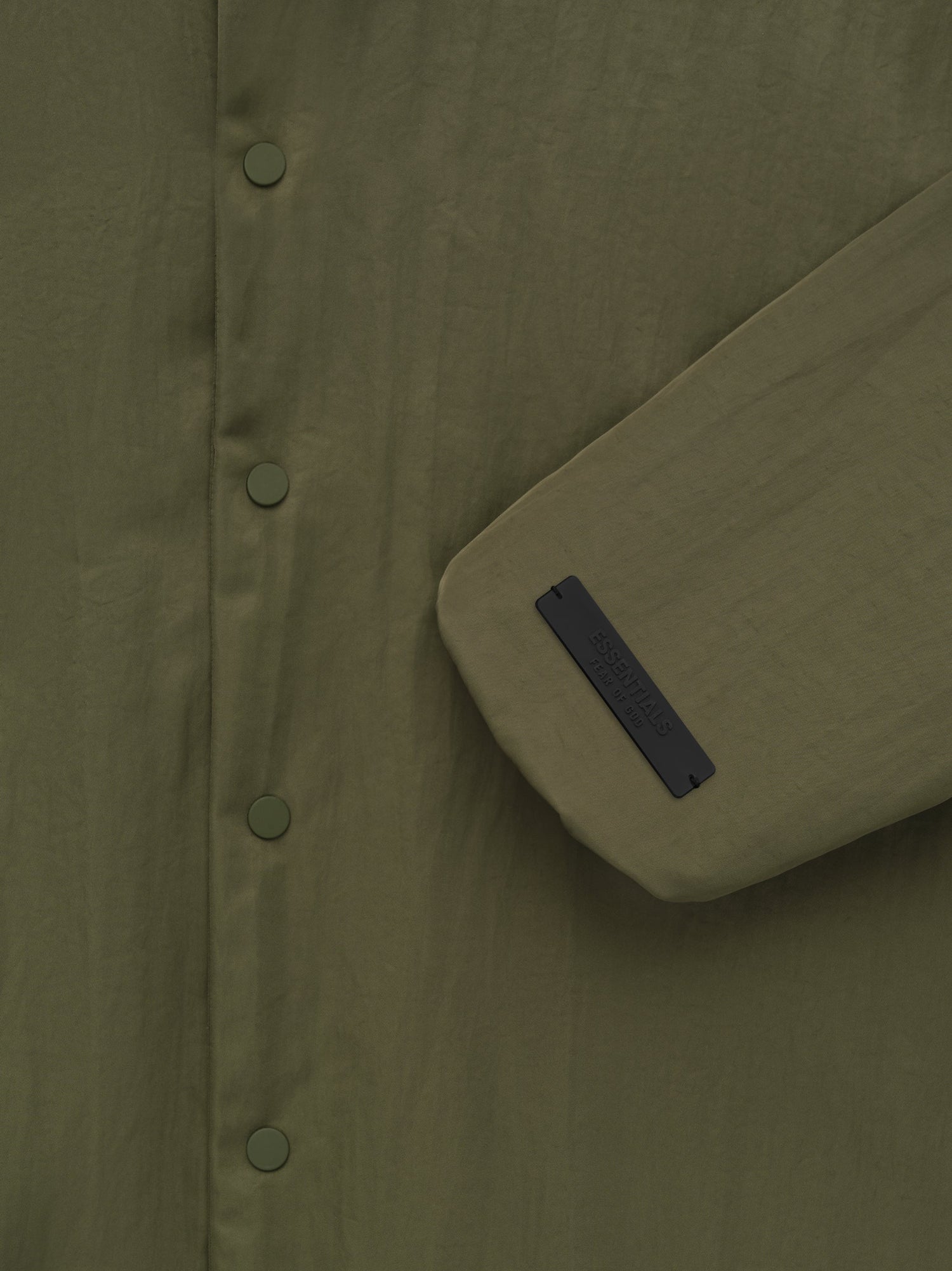 Fear of God Essentials Textured Nylon Hooded Coaches Jacket in Military - view 3