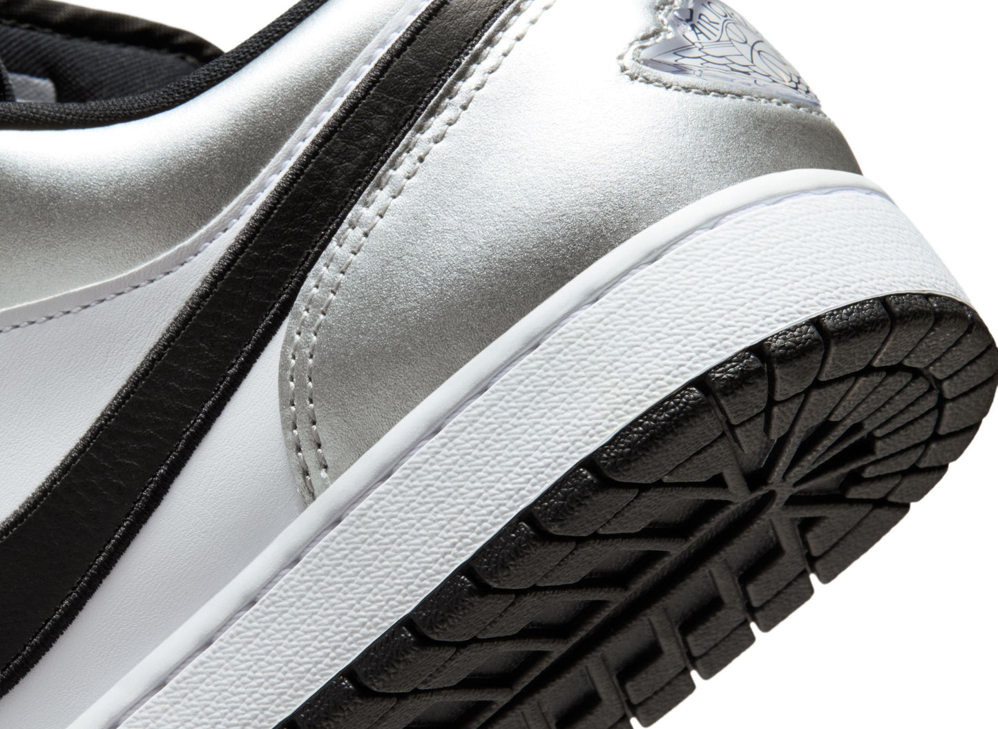 Air Jordan 1 Low SE in White / Black / Metallic Silver