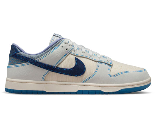 Nike Dunk Low Retro SE in Summit White / Blue Void