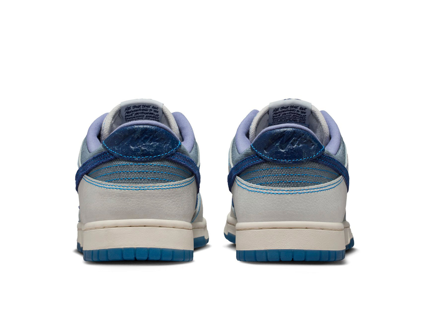 Nike Dunk Low Retro SE in Summit White / Blue Void