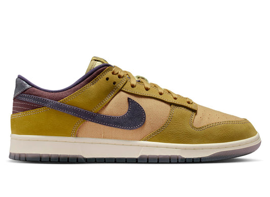 Nike Dunk Low Retro SE in Buff Gold / Dark Raisin