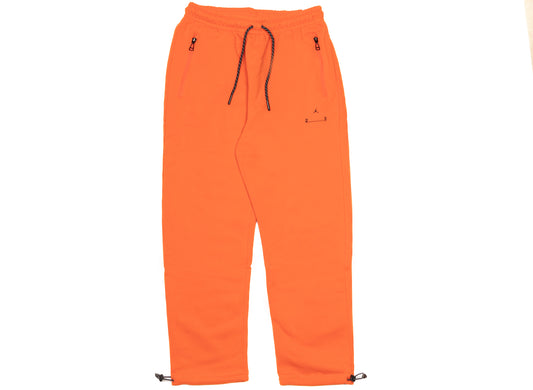 Jordan 23 Engineered Pants in Team Orange / Black