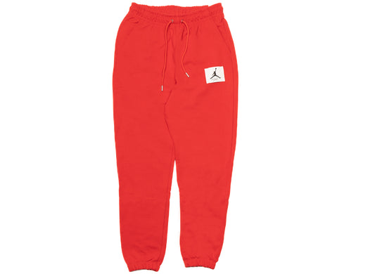 Jordan Essentials Pants in Fire Red / Sail