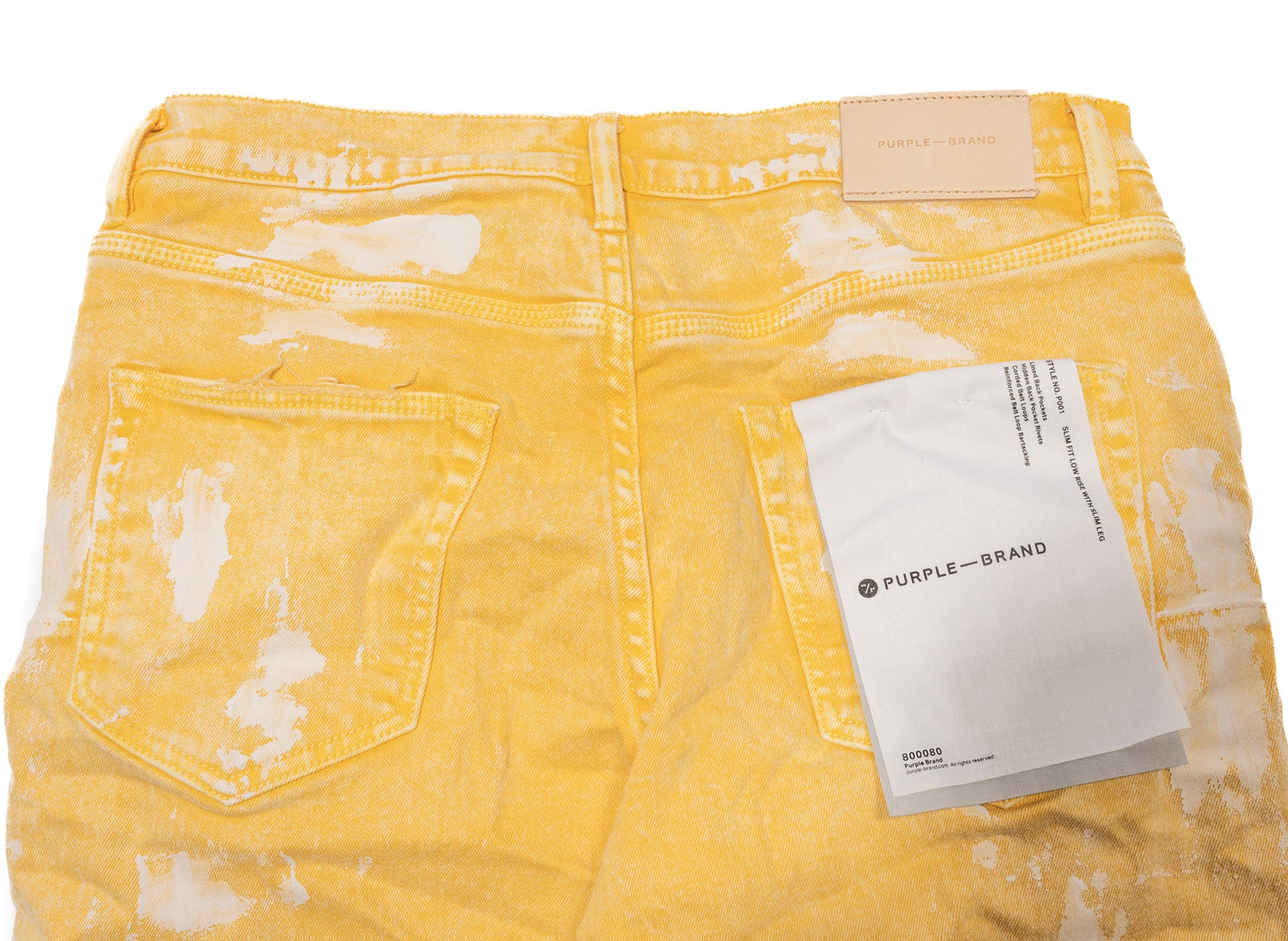 Pantalones vaqueros encerados duros de color amarillo brillante de la marca Purple